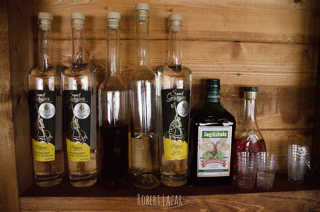 Palinka bottles in the bear hide